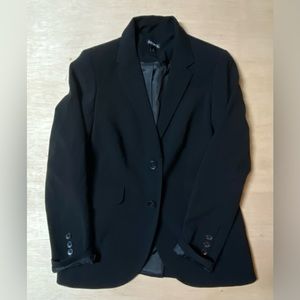 Beautiful black blazer. Perfect for the office. Very cute and comfy.